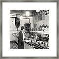 Young Woman Being Served At Cafeteria Framed Print