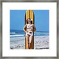 Young Woman Leaning On A Surfboard Framed Print