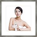 Beautiful Young Woman With Lotion #1 Framed Print