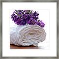 Lavender Flowers On A White Bath Towel In A Spa Framed Print