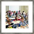 Multi-ethnic Students Sit Into The Class For The First Day At School #1 Framed Print