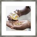 Pouring Capsules Into Hand #1 Framed Print