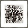 1920s Group Of Smiling Women Wearing One Piece Bathing Suits And Caps Posing Lined Up On Beach Framed Print