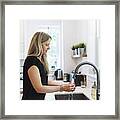 Woman Preparing Lunch In Home Kitchen. #2 Framed Print