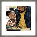 Father And Daughter Eating Take Out Food Outdoors. #3 Framed Print