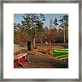 A Bench And A Boat Framed Print