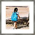 A Black-haired Girl With A Blue Backpack, Turned Her Back, Walks Through A Park In The Direction Of School. Concept Of Education And Back To School. Framed Print