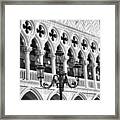 A Typical Venetian Street Lamp In Front Of The Ducal Palace Windows Framed Print