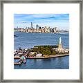 Aerial View Of The Statue Liberty Island In Front Of Manhattan Skyline. New York. Usa Framed Print