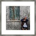 Aged Window Woman Framed Print