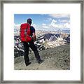 An Adult Male Looks Out Over A Mountain Range Alone On A Remote Mountain Trail Framed Print