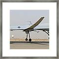 An Mq-1 Predator Unmanned Aircraft Prepares For Takeoff In Support Of Operations In Southwest Asia. Framed Print
