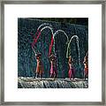 Balinese Boys Playing With Colorful Slayers In The Tukad Unda Waterdam Framed Print