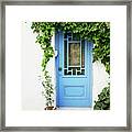 Blue Door And Vine Framed Print
