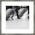 Blurred movement of Travellers with luggage Framed Print