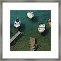 Boats In Green Water Framed Print