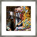 Brightly Painted Carousel Horses Framed Print