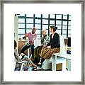 Business Colleagues In Meeting With Female Amputee Sitting On Desk Framed Print