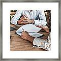 Business People Negotiating A Contract Framed Print