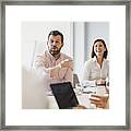 Businessman With Beard Explaining In Meeting With Colleagues Framed Print