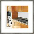 Cabinets, Counters And Stove In Modern Kitchen Framed Print