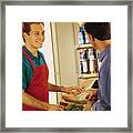 Cashier With Customer At Grocery Store Framed Print