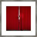Caucasian Businessman Holding Microphone From Behind Curtain Framed Print