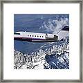 Challenger Corporate Jet Over Snowcapped Mountains Framed Print