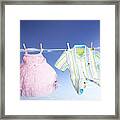 Children Clothes Hanging On Washing Line, Low Angle View Framed Print