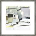 Close Up Of Coffee Cup And Eyeglasses On Paperwork Near Laptop Framed Print