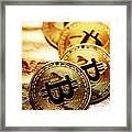 Closeup Of Golden Bitcoin Over Gold Background Framed Print