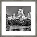 Clouds Over The Pond Framed Print