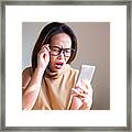 Concept Of Disappointed, Business Asian Woman Used Smart Phone And Fail Something. Framed Print