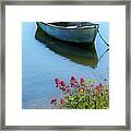 Creekside Flowers And A Boat Framed Print