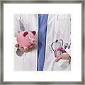 Doctor With Piggy Bank Framed Print