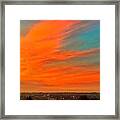 Dramatic Sky Over Town Framed Print