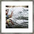 Elderly Caucasian Couple Sleeping On The Bed Framed Print