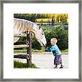 Feeding A Horse Framed Print