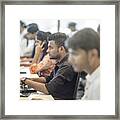 Female And Male Entrepreneurs Working At Office Framed Print