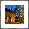 Festive Broadway Village At Dusk Framed Print