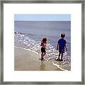 First Time At The Beach Framed Print