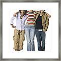 Full Length Shot Of A Group Of Three Teenage Female Friends As They Smile At The Camera Framed Print