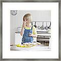 Girl Baking Cupcakes In Kitchen Framed Print