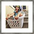 Girl Going Down Stairs In Laundry Basket Framed Print