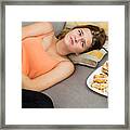 Girl Is Having A Stomach Ache After Eating Many Cake Framed Print