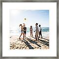 Group Of People Playing Beach Volleyball Framed Print