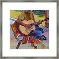 Guitarist At The Park Framed Print