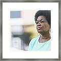 Head And Shoulders Of Serious Mature Black Woman Framed Print