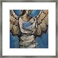 In The Arms Of An Angel Framed Print