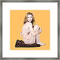 Isolated Pinup Girl Sitting On Soft Blanket Framed Print